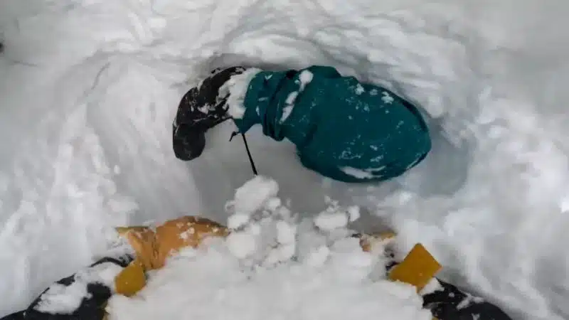 A snowboarder got buried upside down in snow. See skier’s quick reaction. | CNN