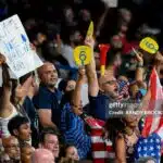 Supporters of USA cheer for their team during the ICC men's Twenty20 World Cup 2024
